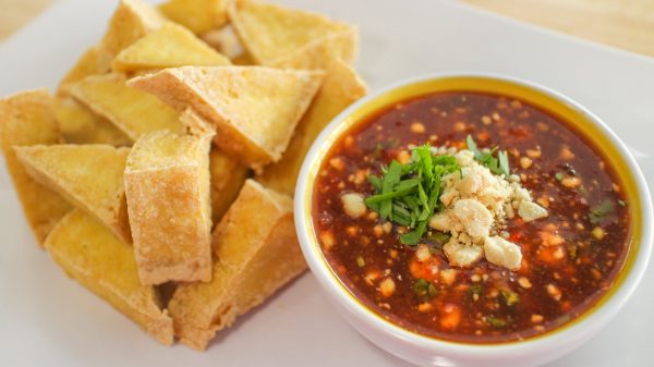 Simple Thai appetizer, fried tofu with Thai sauce.