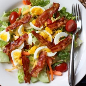 Thai style salad with bacon and egg.