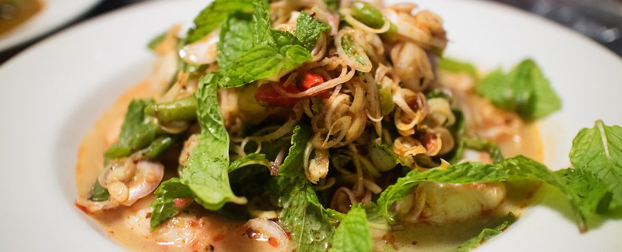 Spicy Thai seafood salad with Thai herbs